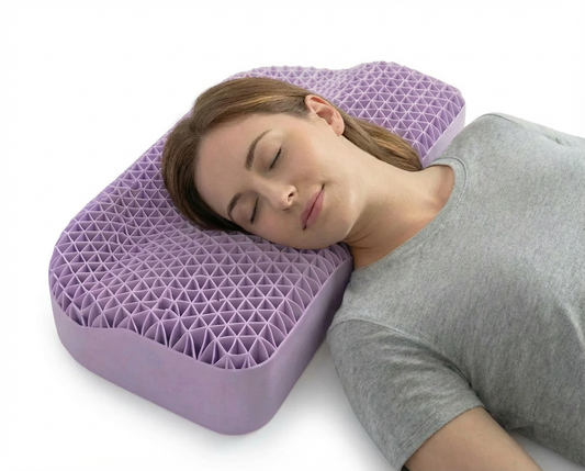 Woman sleeping on a purple honeycomb pillow against a light white background1